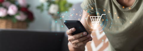Man using smartphone with online shopping application