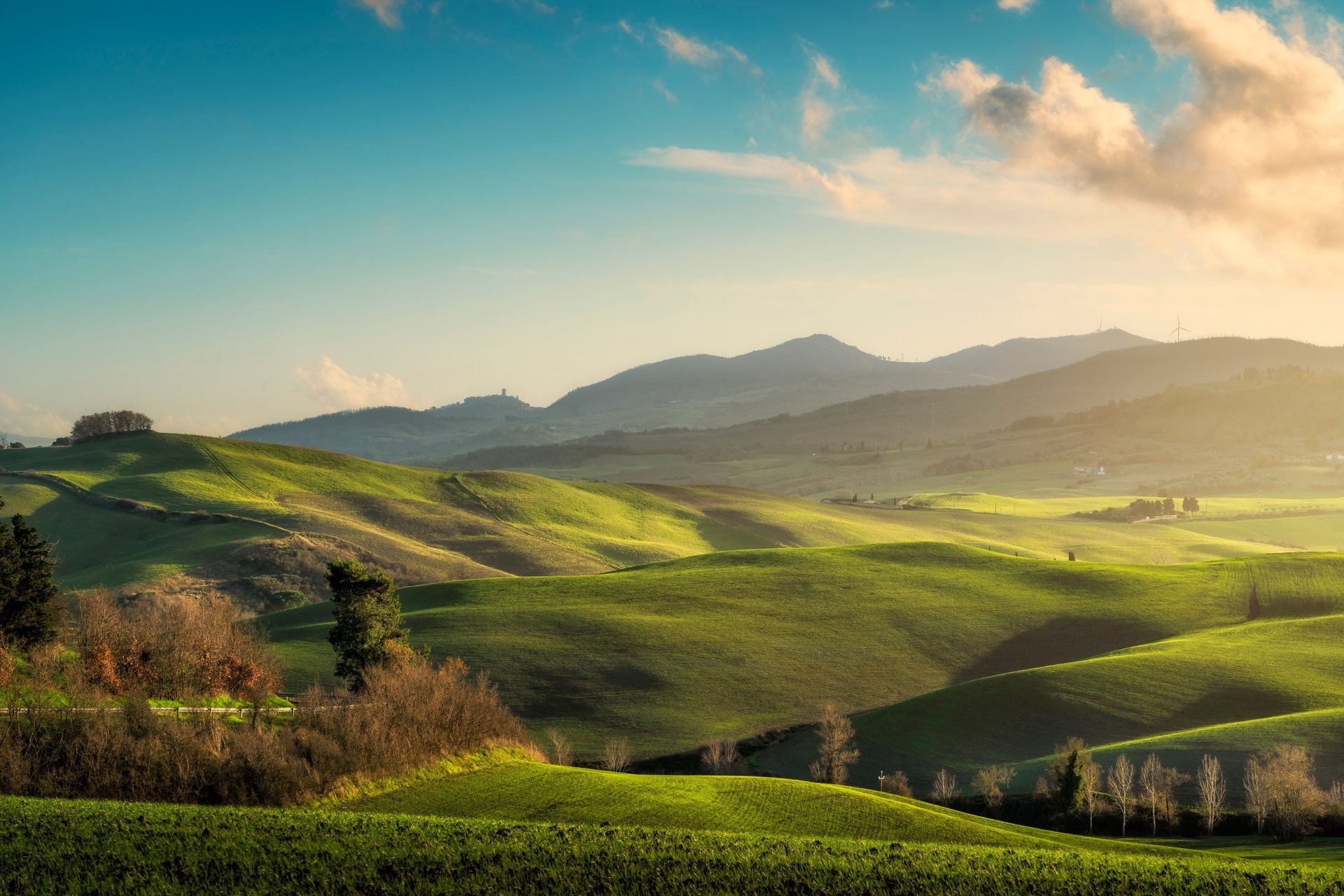 Welsh countryside at sunset with rolling hills
